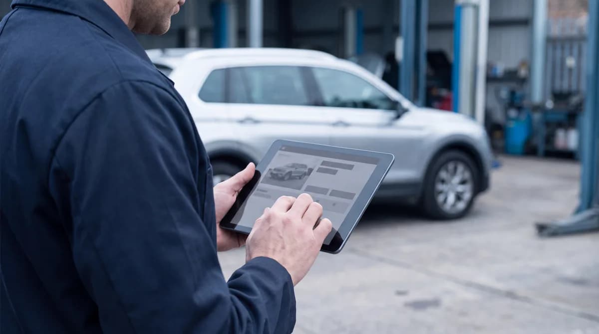 Illustration: reviewing vehicle information on a tablet